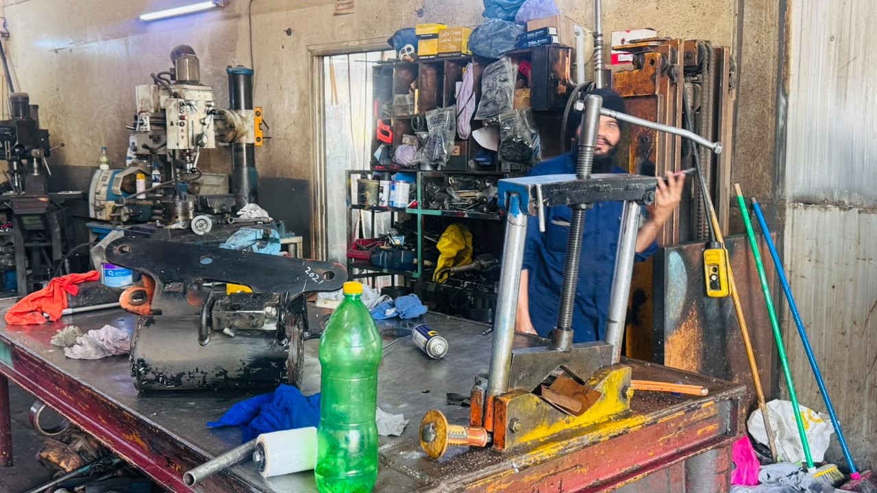 Automotive repair technician working on a vehicle in Dubai
