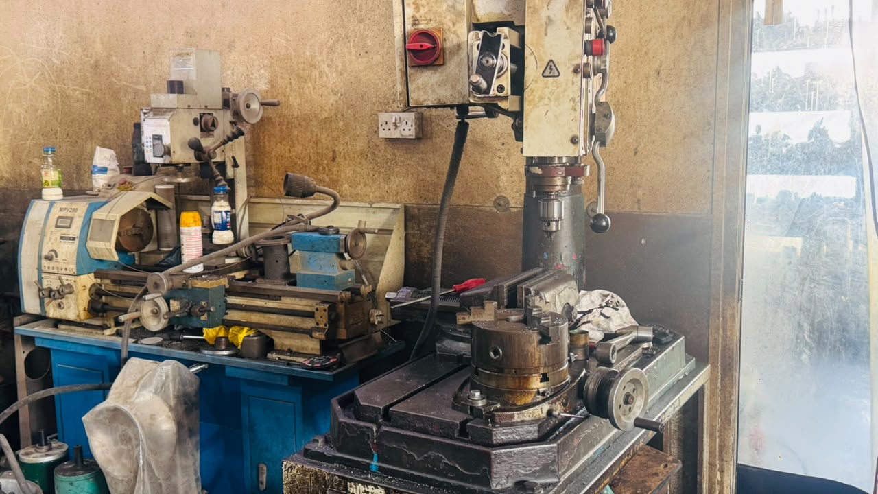 Professional mechanic inspecting a vehicle engine in Dubai